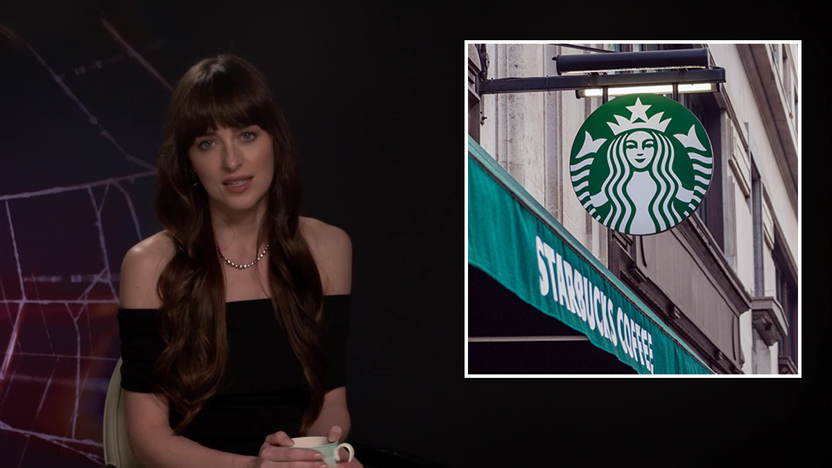 Dakota Johnson at a press interview next to a cutout of a Starbucks location.