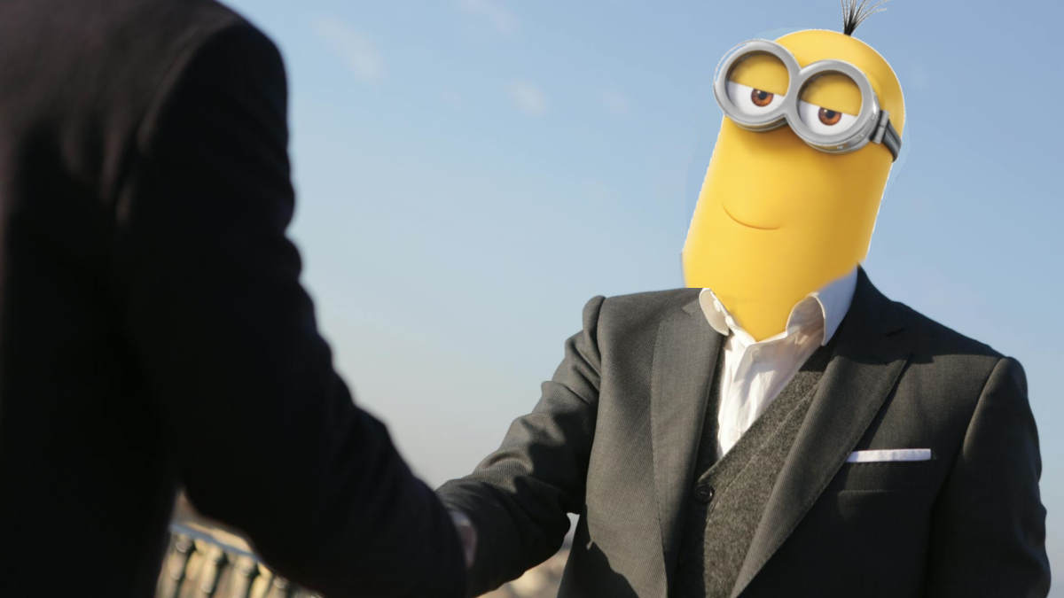A mediocre photoshop of a Minion in a suit, shaking someone's hand.